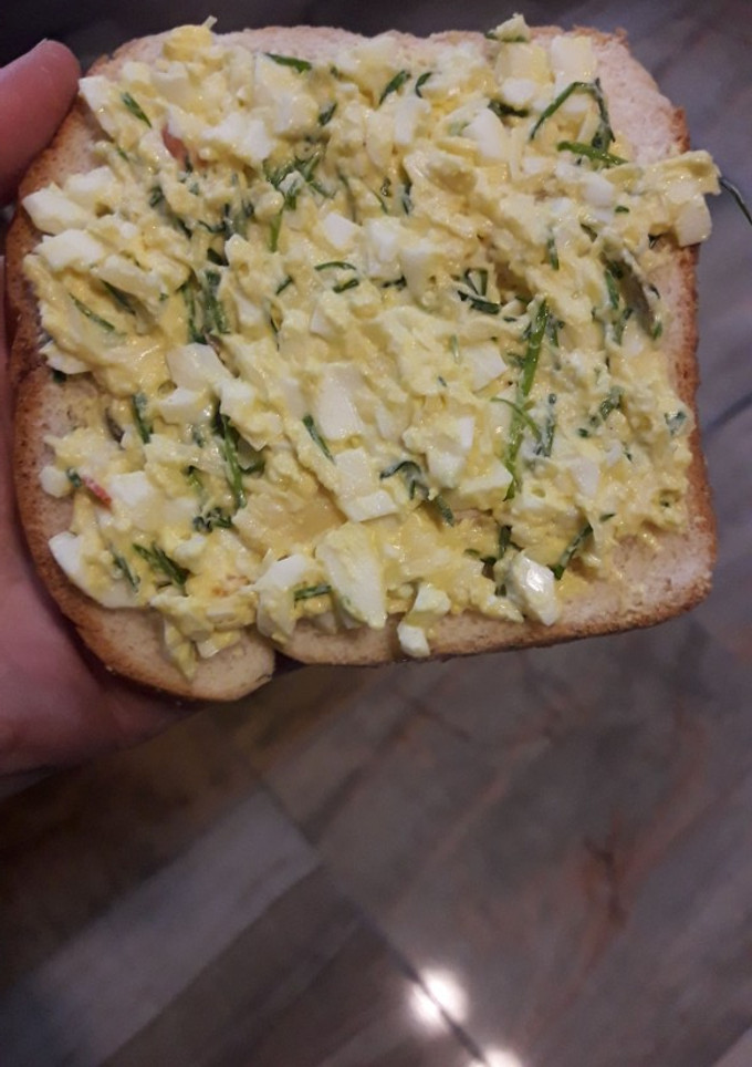A picture of Imitation of eggs canape- deviled eggs on bread.