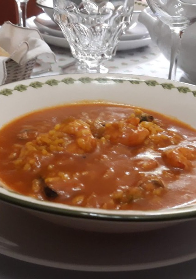 Una foto de Arroz caldoso con marisco