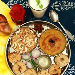 A picture of Jowar Baati, Panchmel Dal & Churma.