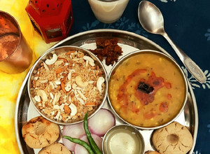 A picture of Jowar Baati, Panchmel Dal & Churma.