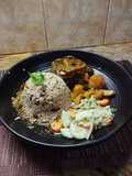 Ossobuco Stew Served with Jamaican Beans in Rice