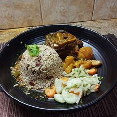 Ossobuco Stew Served with Jamaican Beans in Rice A picture of Ossobuco Stew Served with Jamaican Beans in Rice.