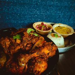 A picture of Pakistani streetstyle Chicken Karahi/ Kadai Chicken.
