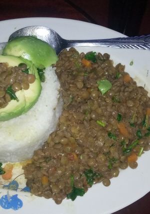 A picture of Rice with lentils and spinach.