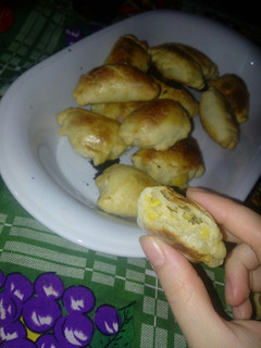 Una foto de Empanadas de choclo cebolla y queso