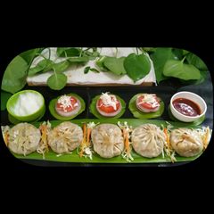 A picture of Veg Cheese Corn Momos.