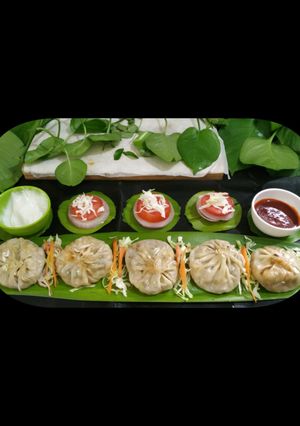 A picture of Veg Cheese Corn Momos.