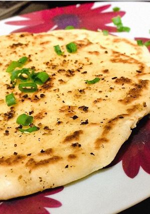A picture of Garlic Naan Bread.