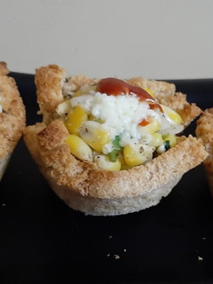 A picture of Colourful Cheesy Sweet Corn Bread katori.
