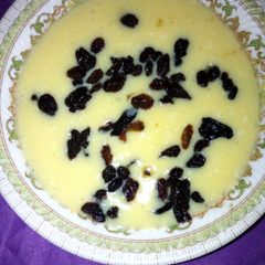 A picture of Custard with dry grapes.