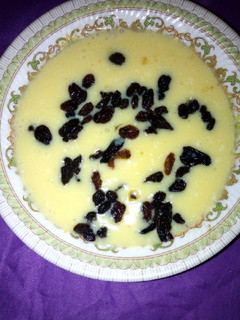 A picture of Custard with dry grapes.