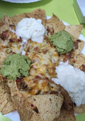 A picture of Nachos with Ground Beef.