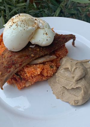 A picture of Smoked PiriPiri mackerel with tomato couscous and hummus.