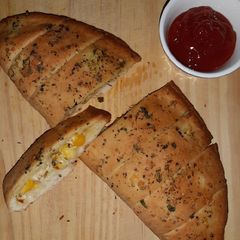 A picture of Stuffed Chessy Garlic Bread.