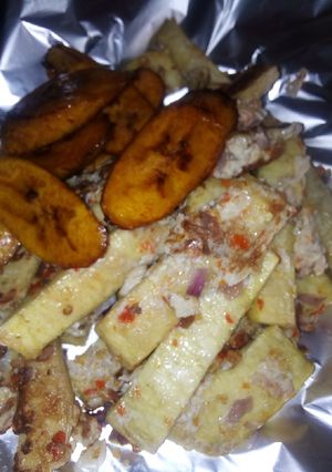 A picture of Yam into egg with plantain.