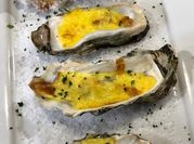 Una foto de ostras de queso