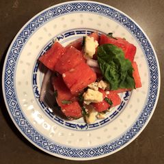 A picture of Watermelon, Gorgonzola, and Fresh Basil Salad with Columbia Restaurant 1905 Salad Dressing.