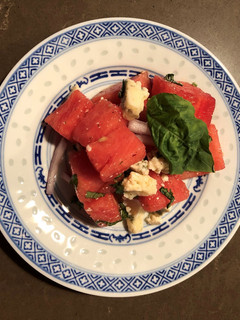 A picture of Watermelon, Gorgonzola, and Fresh Basil Salad with Columbia Restaurant 1905 Salad Dressing.