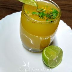 A picture of Orange ginger detox shot.