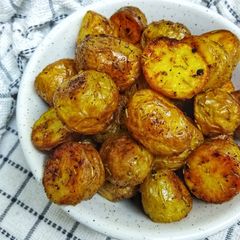 A picture of Garlic & Rosemary Roasted New Potatoes.