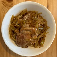 A picture of Pork Chop with Onion Sauce 洋蔥汁煎豬扒.