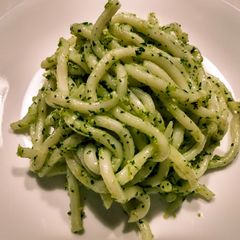 A picture of Udon with cilantro pesto.