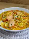 Arroz caldoso con chipirones y almejas