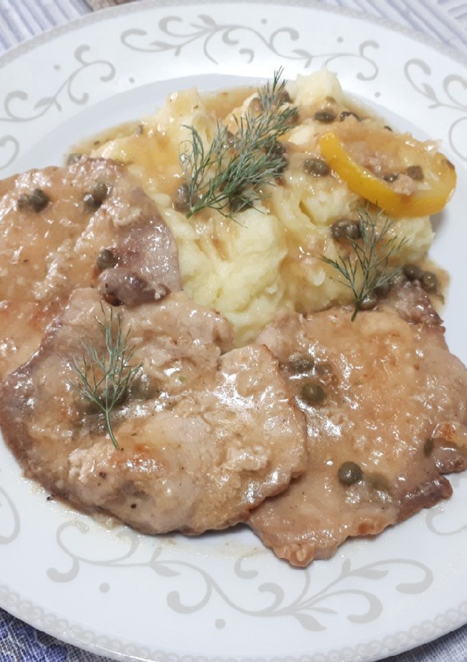 Una foto de Lomo al limón con alcaparas