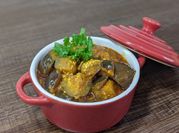 A picture of brinjal tomato curry