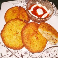 A picture of Bread chicken patties.