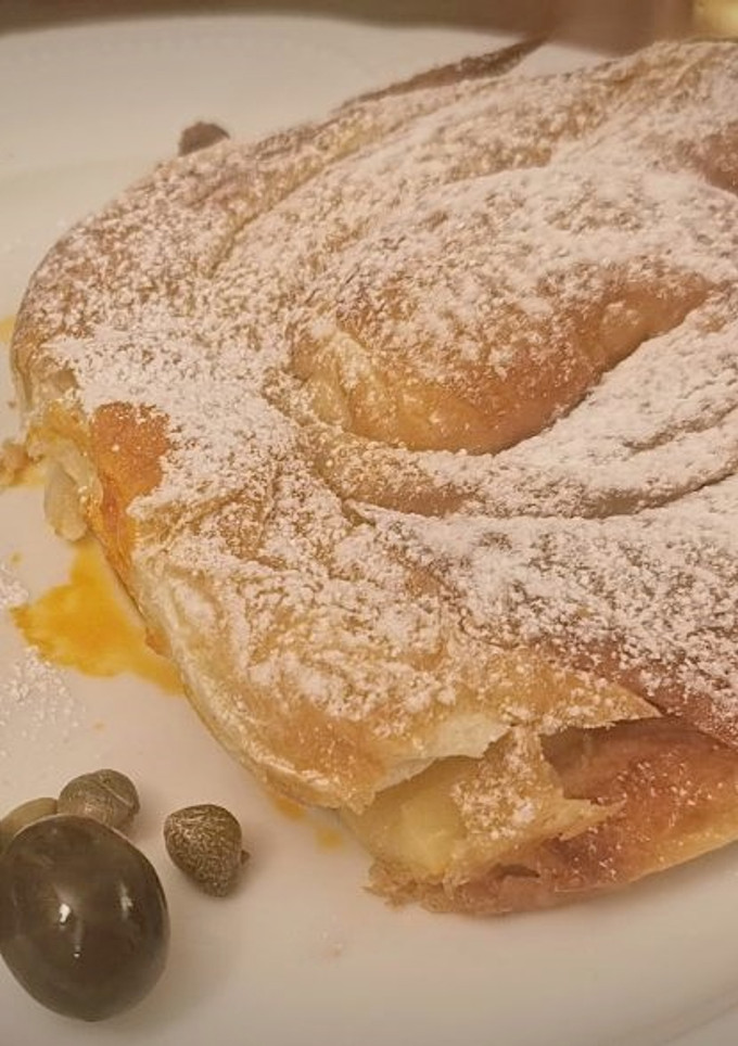 Una foto de Sándwich Balear de Ensaimada