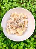 Calamarata con trota fario e fiori di zucca