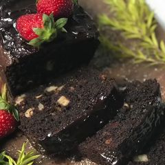 A picture of Eggless moist and divine chocolate cake.