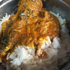 A picture of Rice and ofe akwu.