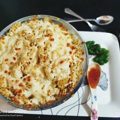 A picture of Baked Cheese White Sauce Pasta.