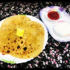 A picture of Whole wheat paneer stuffed parathas.