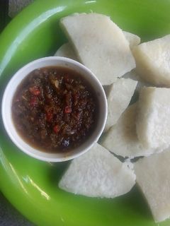 A picture of White yam with minced meat sauce.