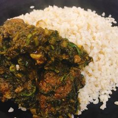A picture of Vegetable soup and local rice.