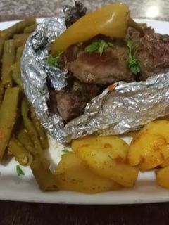 صورة لوصفة لحم مفور مع الخضار ومحمر