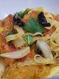 Pasta with oven-roasted tomato and onions, basil, black garlic and balsamic vinagre