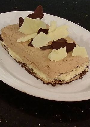 A picture of Orange Milk Chocolate and White Chocolate Mousse Torte.