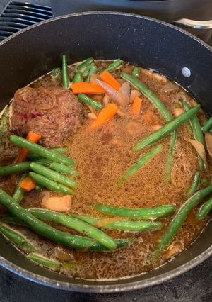 A picture of Hamburger Steak with Mushrooms, Green Beans & Carrots.