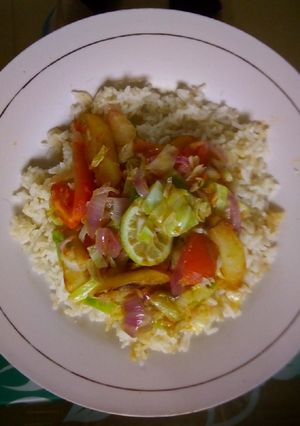A picture of Rice and stir fried veggies.
