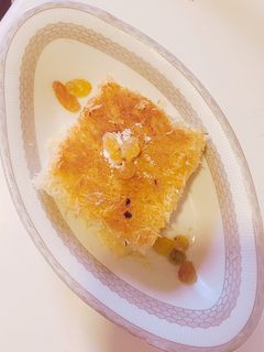 صورة لوصفة كنافه بالقشطه والزبيب لذيذة 🥰😋
