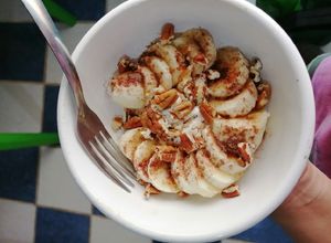 Una foto de Plátanos con yogurt y cocoa