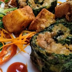 A picture of Baked Spinach chicken cheese roll.