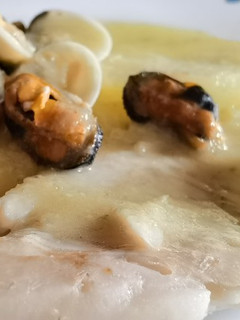 Una foto de Merluza en salsa verde mambo