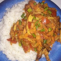 A picture of White rice/steamed veggies with chicken.