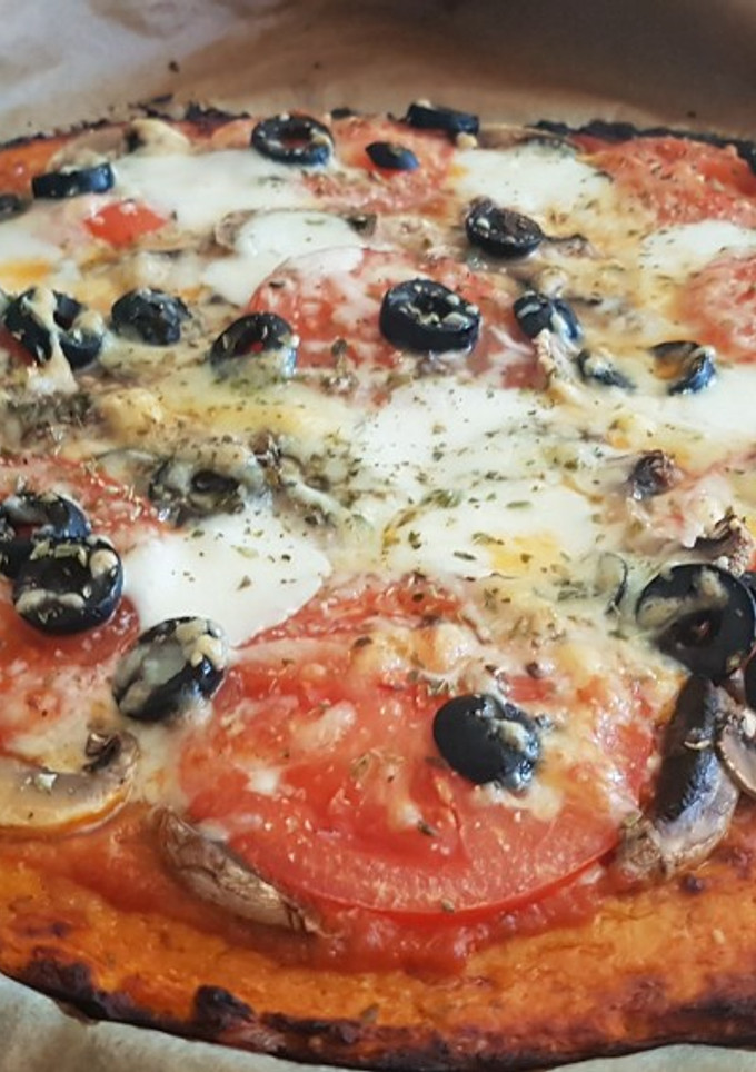 Una foto de Pizza light con base de calabaza 🎃