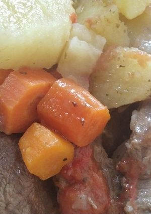 Una foto de Bife a la criolla